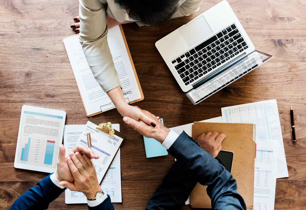 business-people-shaking-hands-together