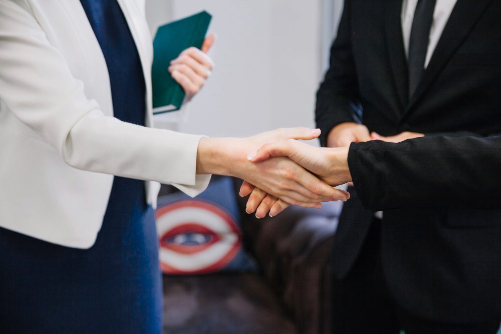 handshake-businessman-businesswoman